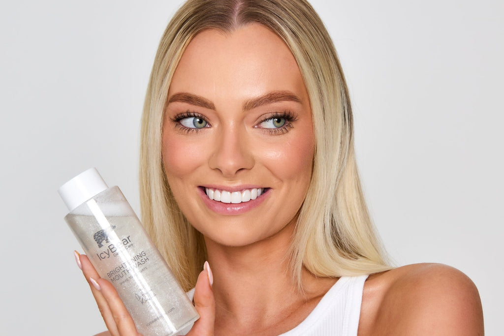 Mouthwash being held by model