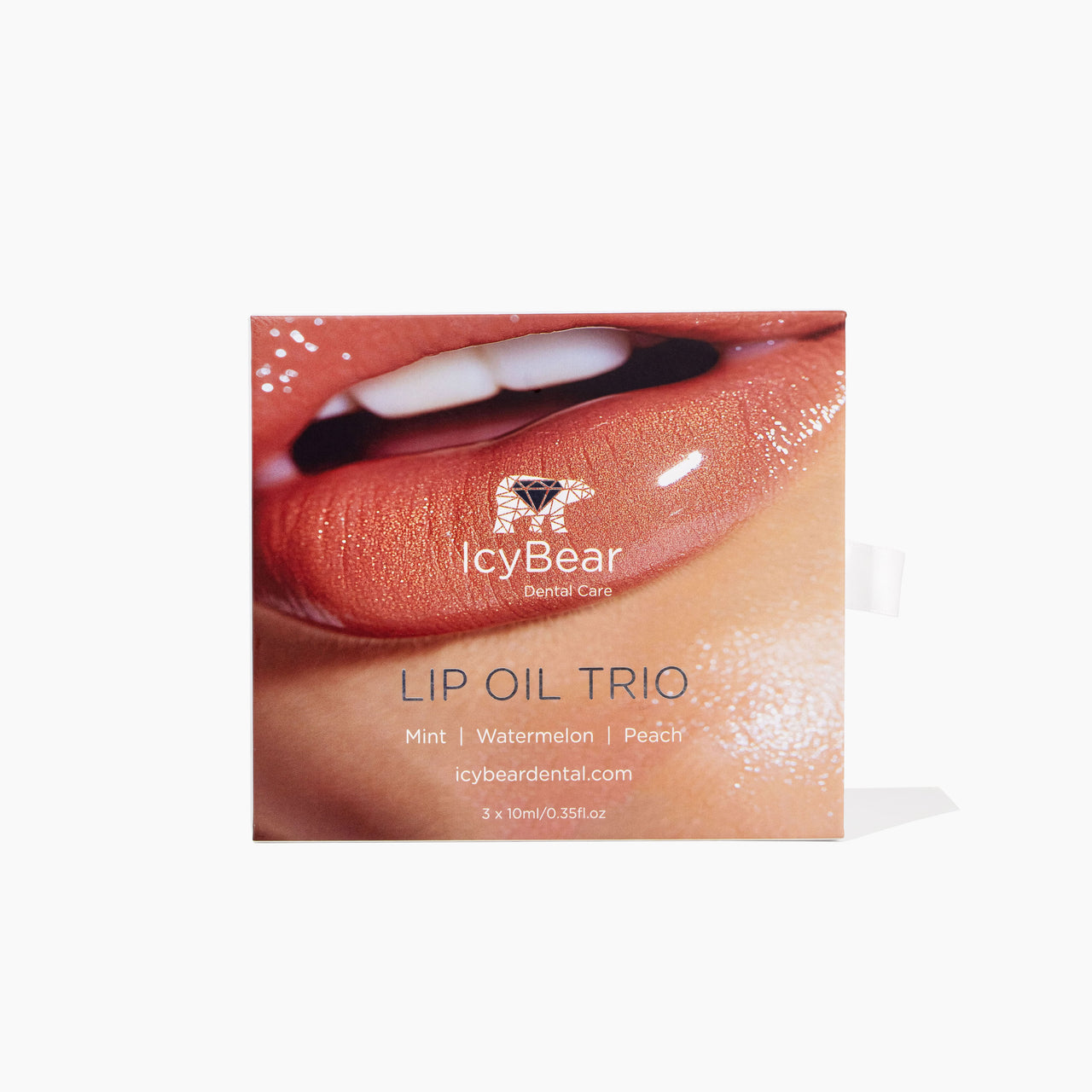 IcyBear Lip Oil Trio box packaging featuring a close-up of glossy peach-toned lips, with the text 'LIP OIL TRIO' and flavor notes 'Mint | Watermelon | Peach' on a white background.