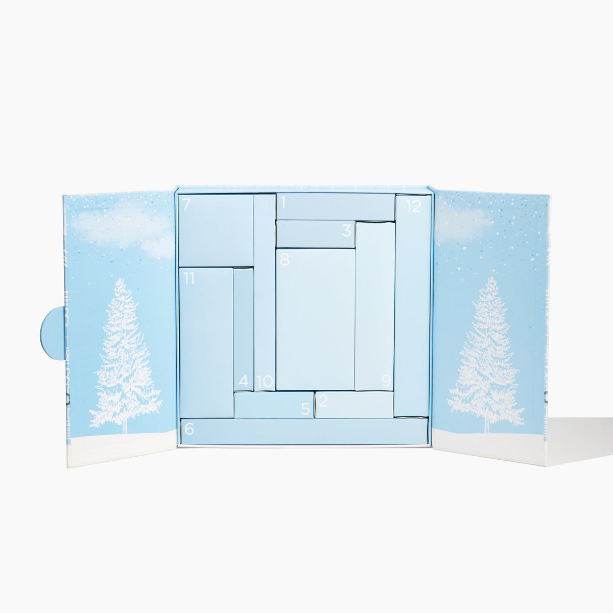 Icy Bear 12 Days of Teeth Whitening Advent Calendar open showing 12 numbered doors